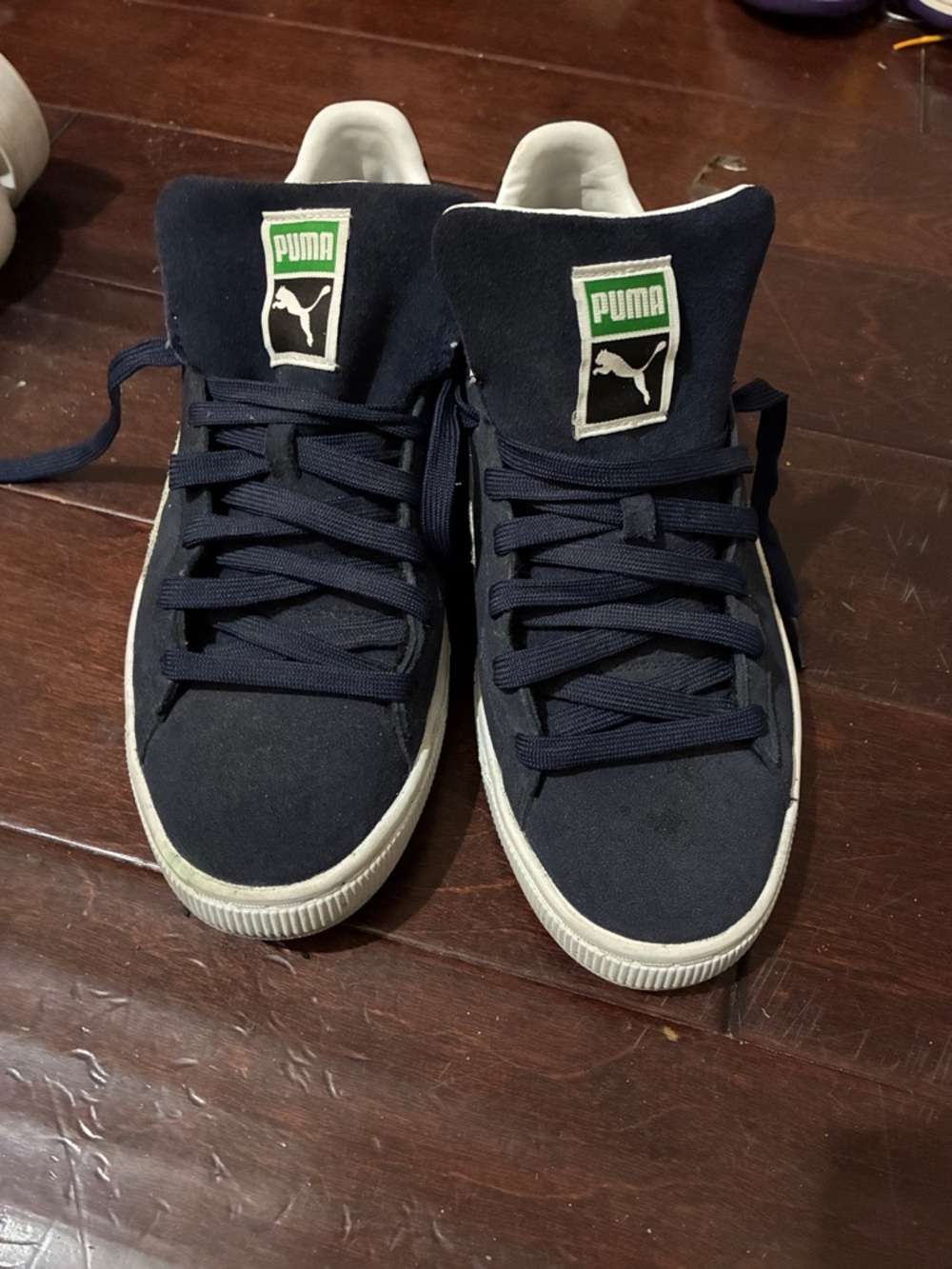 Puma Navy Suede Sneakers with White Soles and Green Logo